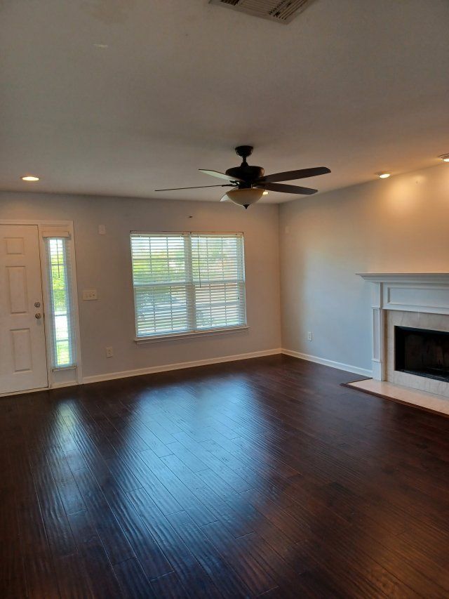 Privacy Fenced Back Yard. Storage Bldg. Fireplace. Washer & Dryer. Master BR downstairs property image