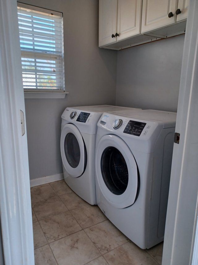 Privacy Fenced Back Yard. Storage Bldg. Fireplace. Washer & Dryer. Master BR downstairs property image