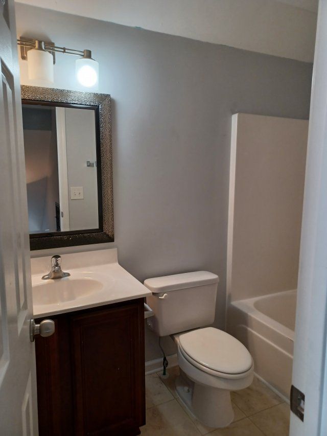 Privacy Fenced Back Yard. Storage Bldg. Fireplace. Washer & Dryer. Master BR downstairs property image