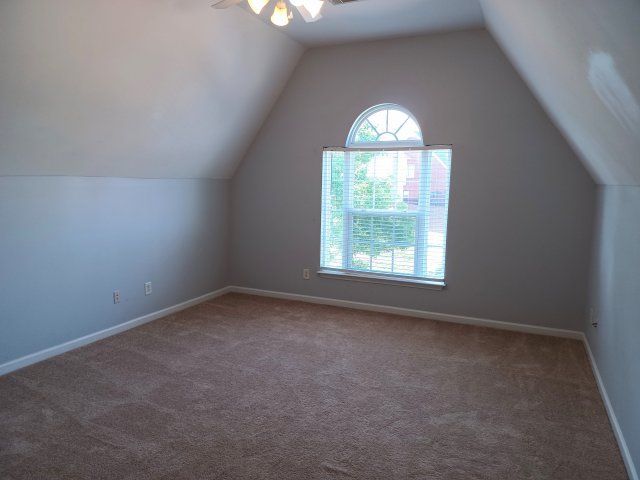 Privacy Fenced Back Yard. Storage Bldg. Fireplace. Washer & Dryer. Master BR downstairs property image