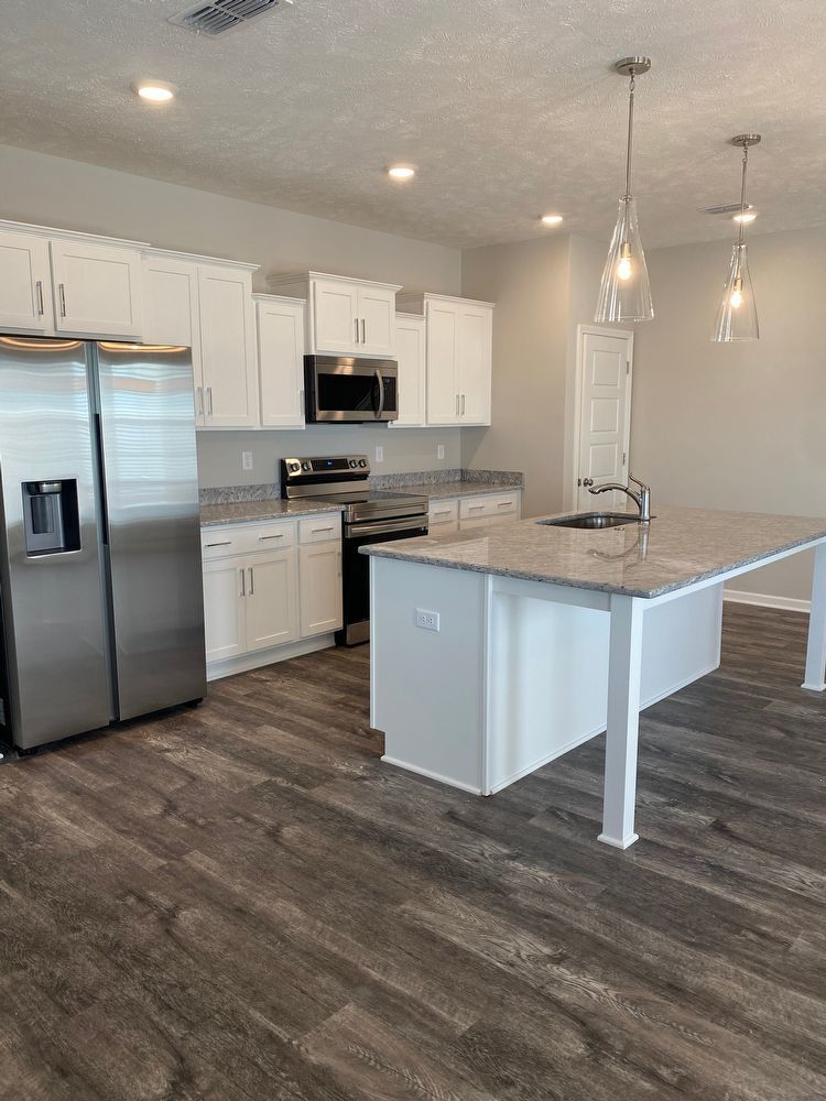 Like New Luxury Townhome! 3 BR, 2.5 BA, 2 Car Garage, Pool, Dog Park, and More! property image