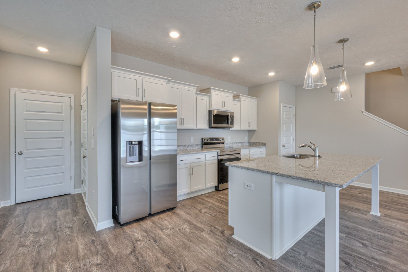 Brand New Luxury Townhome! 3 BR, 2.5 BA, 2 Car Garage, Pool, Dog Park, and More! property image