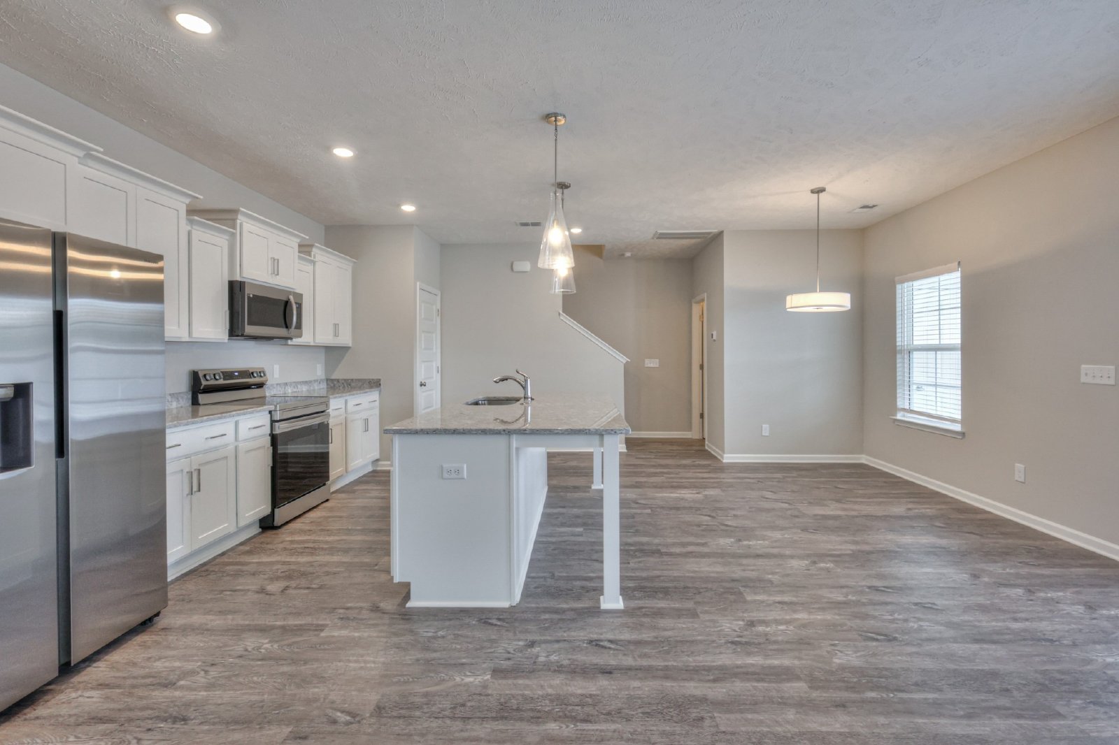 Brand New Luxury Townhome! 3 BR, 2.5 BA, 2 Car Garage, Pool, Dog Park, and More! property image
