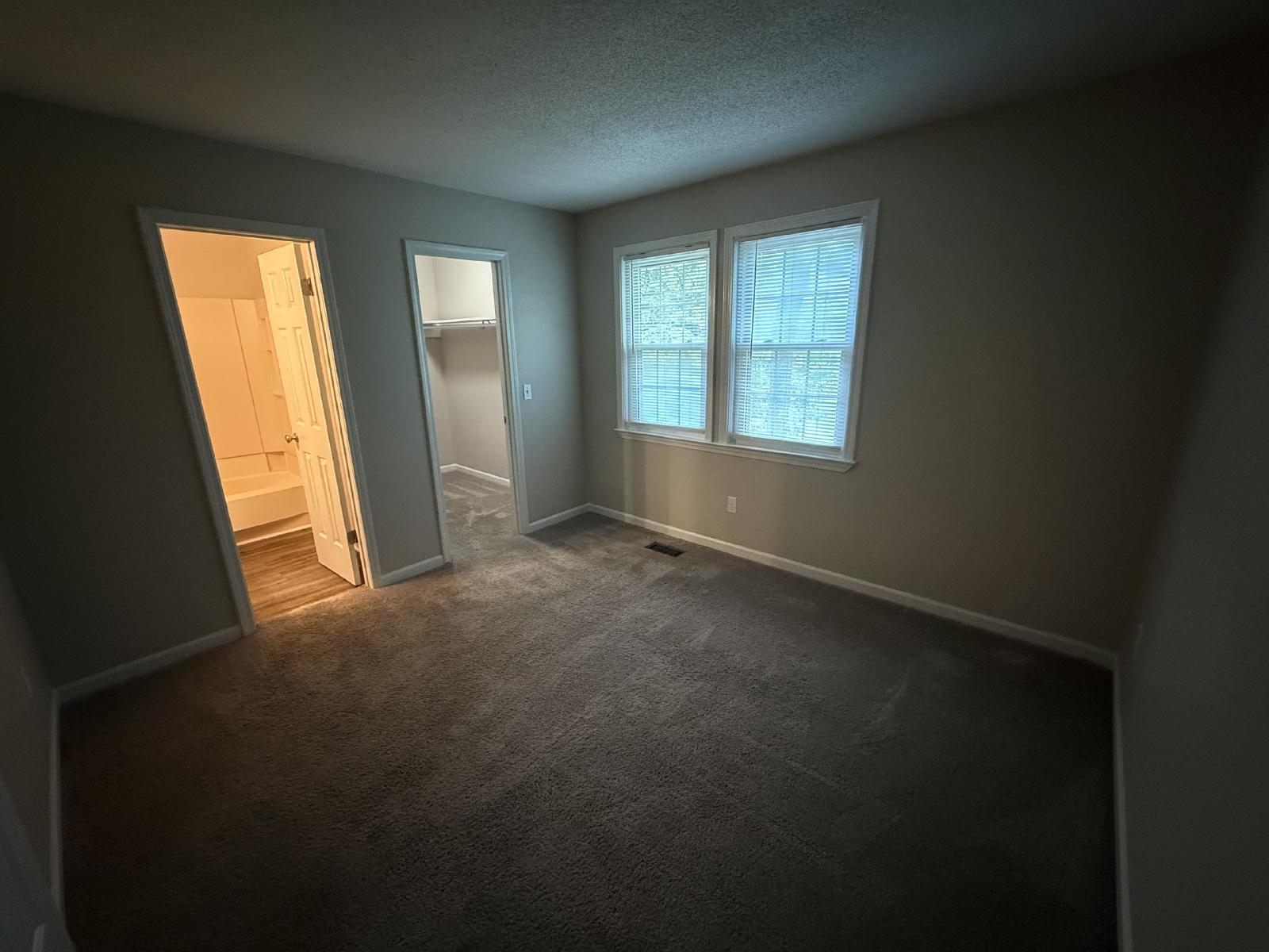 Beautiful 2BR Townhome | Huge Private Deck | Lawn Care Included | $1,695/mo property image