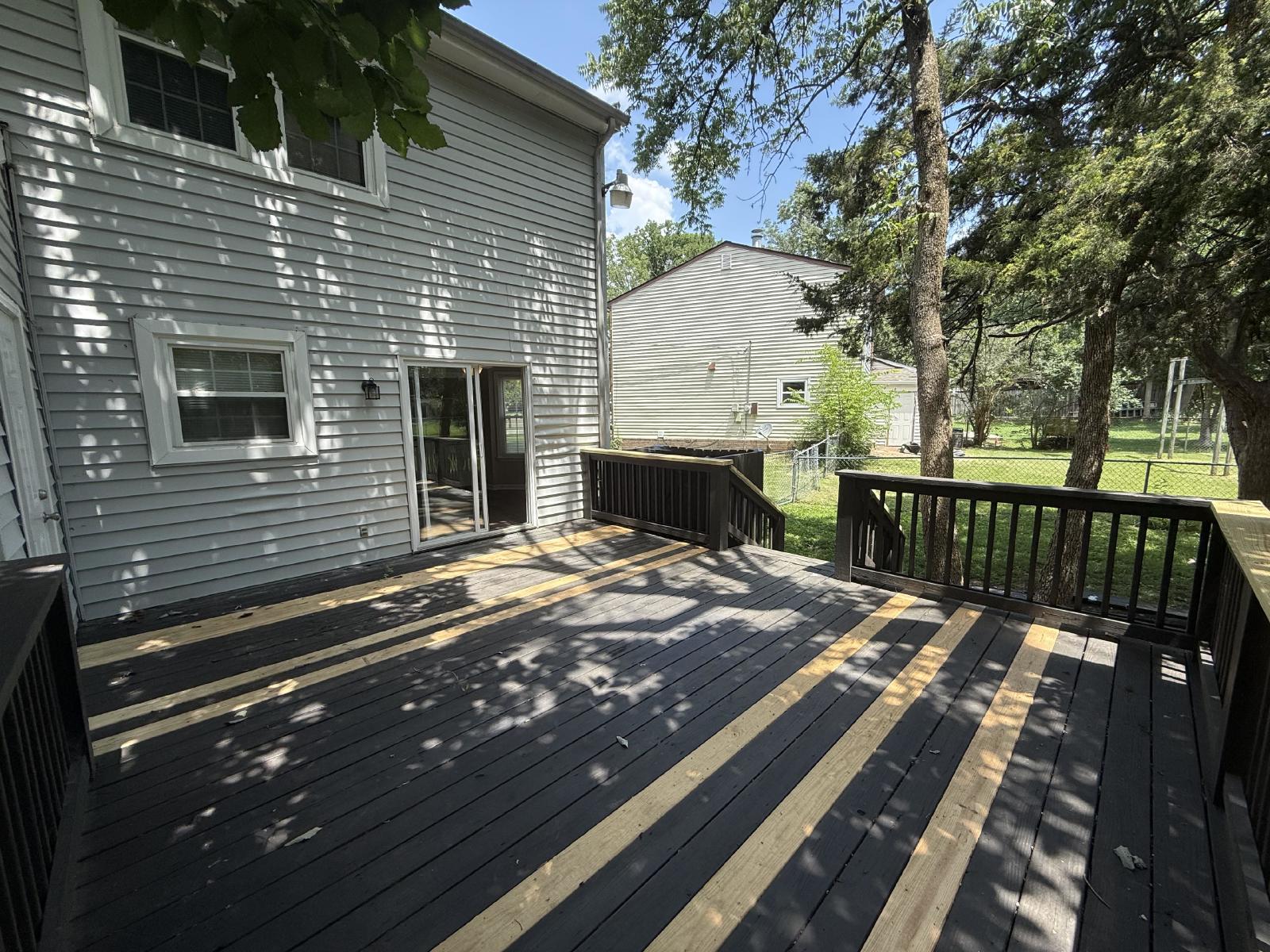 Beautiful 2BR Townhome | Huge Private Deck | Lawn Care Included | $1,695/mo property image
