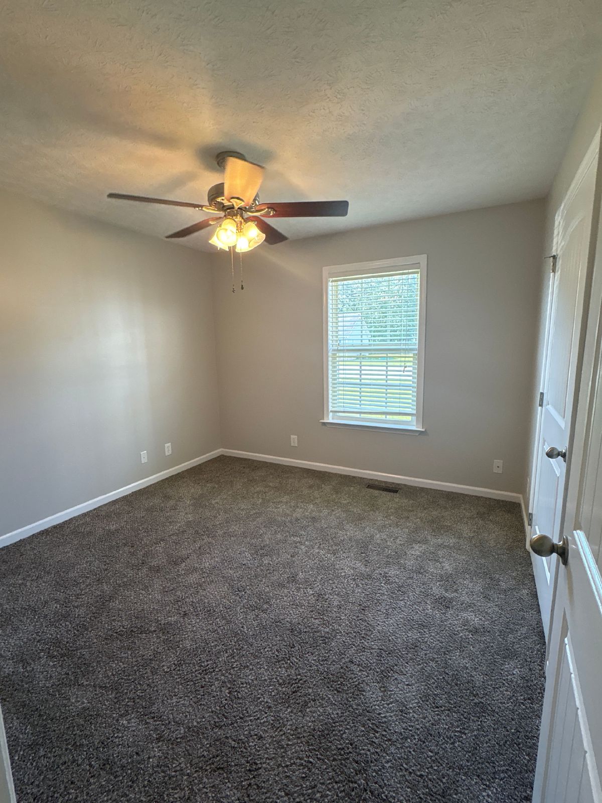Charming Home with Covered Deck and Fenced in Back Yard... property image